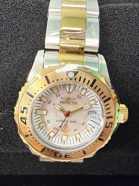 Invicta Swiss Ronda 585
Caliber Women's Watch w/ Mother of Pearl Dial